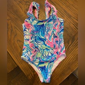 Girls swim suit. Tommy Bahama size 8. New, never worn, but the tags are off.